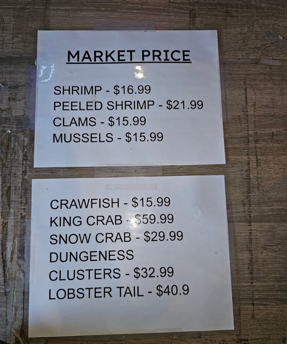 Menu page with seafood, gumbo, and po' boys.